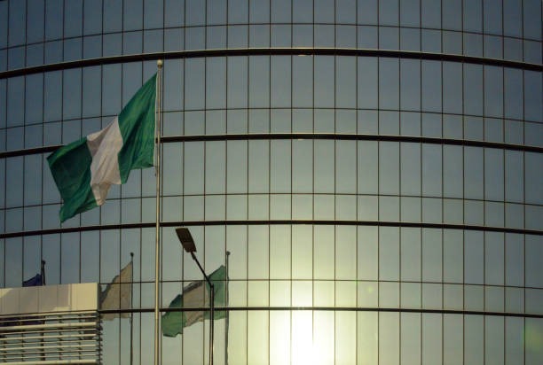 Imgi 44 Flag Of Nigeria And Modern Glass Facade Lagos Nigeria 2